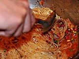Dressing the noodles (difficult to separate)