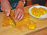 Cutting frozen jackfruit into thin strips