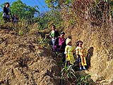 Walking down the hill for the parade, Hmong New Year 2013 at Mae Sa Mai