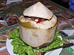 Seafood curry in a young coconut at Toh Plue
