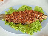 Fried fish topped with sweet chili sauce at Sunee Restaurant, Pranburi Marina