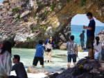 Ferry passengers taking a few moments at the arch on Koh Khai