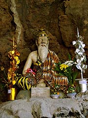 Hermit statue at Thampla Fish Cave