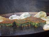 Chive cakes on a smoking hot griddle, Sukhmvit near Thonglor, Bangkok