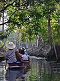 Navigating a Side Canal at Damoen Saduak Floating Market