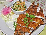 Fried fish with green mango