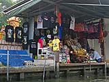Typical souvenir stall along the canal, Damnoen Saduak Floating Market