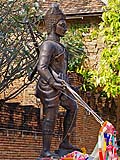 Guard figure outside the temple wall, Wat Phra That Lampang Luang