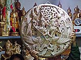 Intricate wood carvings for sale in the market, Mae Hong Son