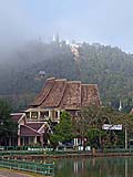 View of Wat Phra That Doi Kong Mu through the fog, Mae Hong Son