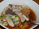 Rice noodles and various cuts of pork in five-spice broth, Mae Hong Son
