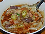 Pork soup noodles with optional seasonings on top, Mae Hong Son