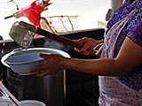 Straining quickly cooked rice noodles, Sukhothai-style Noodle Shop