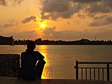 Amber watching the sunset at the point, Songkhla